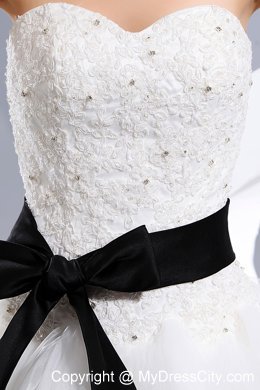Memorable A-line Sweetheart Wedding Dress with Appliques and Black Bow