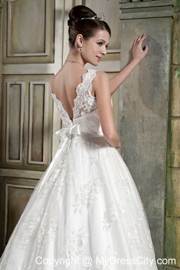 Beautiful V-neck Chapel Train Beaded Wedding Dress in Lace