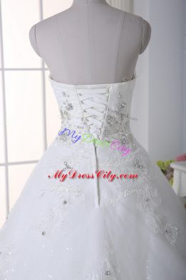 Dramatic Sleeveless Chapel Train Beading and Lace Lace Up Wedding Dress