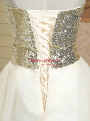 Dazzling Champagne A-line Satin Strapless Sleeveless Sequins and Bowknot Mini Length Lace Up