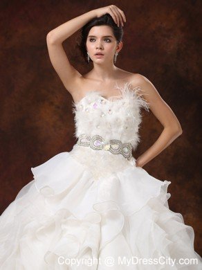 Luxurious Sweetheart Feather Ruffled Garden Wedding Dress with Beading