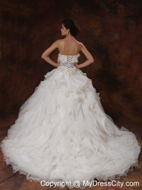 Luxurious Sweetheart Feather Ruffled Garden Wedding Dress with Beading
