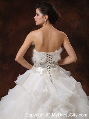 Luxurious Sweetheart Feather Ruffled Garden Wedding Dress with Beading