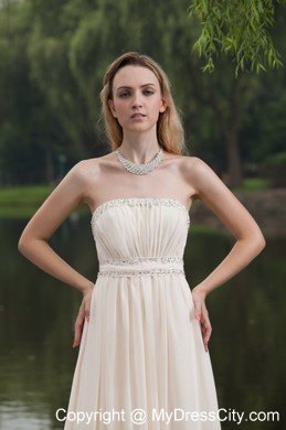 Champagne Empire Strapless Brush Train Prom Dress with Beading
