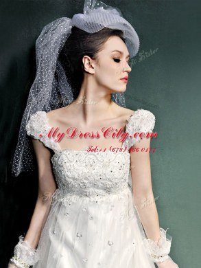 Sumptuous White Empire Tulle Straps Cap Sleeves Beading and Lace and Appliques Lace Up Wedding Dresses Court Train