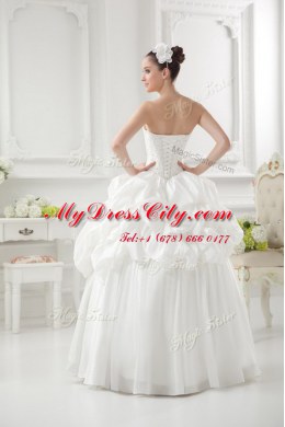 Pretty White Sleeveless Beading and Pick Ups Floor Length Wedding Gowns
