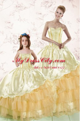 Best Selling Sleeveless Organza Floor Length Lace Up Quinceanera Dresses in Gold with Embroidery and Ruffled Layers