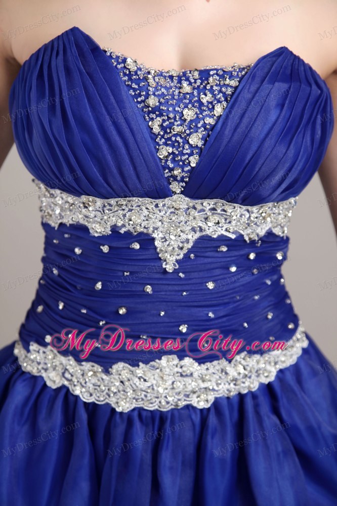 Appliques and Beading Decorate Homecoming Dress With Pick-ups