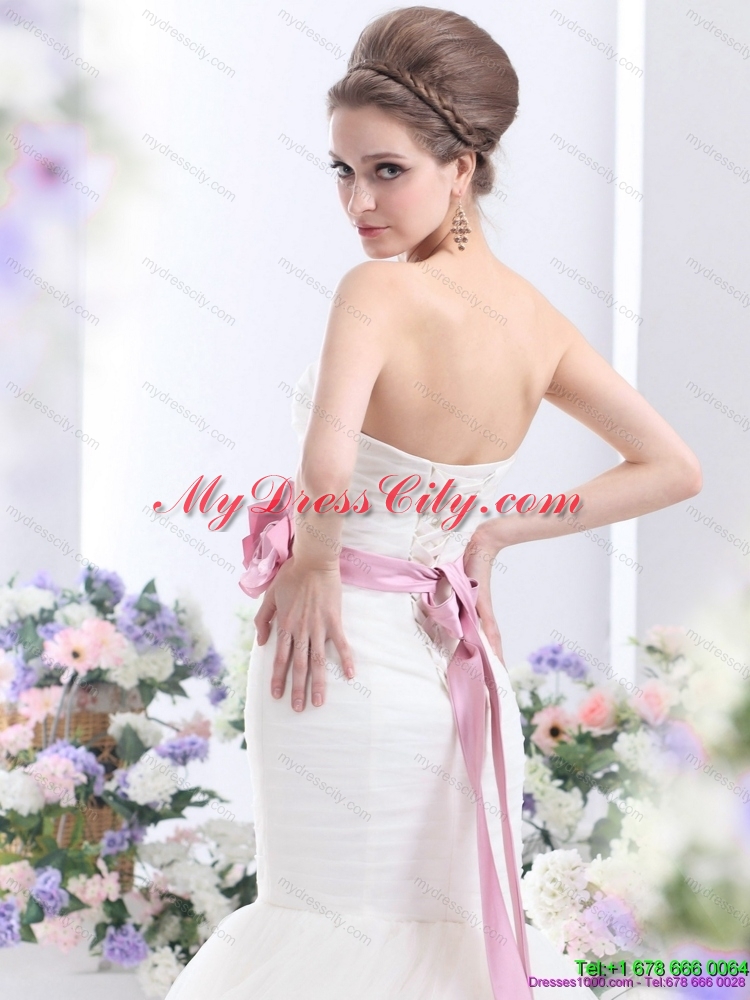 2015 Fashionable Strapless Mermaid colored Wedding Dress with Ruching and Hand Made Flowers